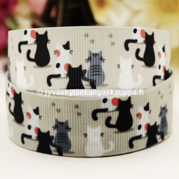 Koristenauha Mustat, Valkoiset ja Harmaat Kissat